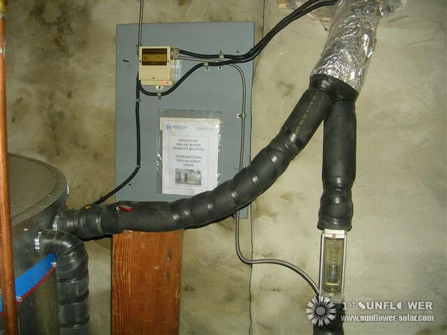 Installation de r&eacute;servoirs de plomberie et de stockage pour syst&egrave;me de chauffage solaire